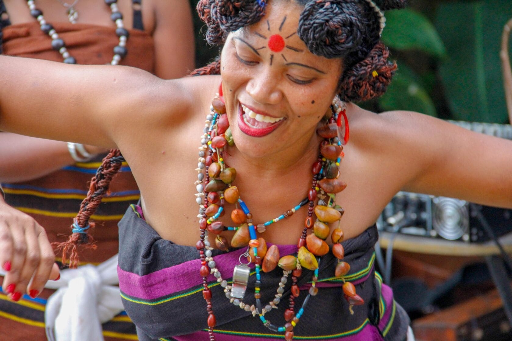 A woman in Madagascar dancing.