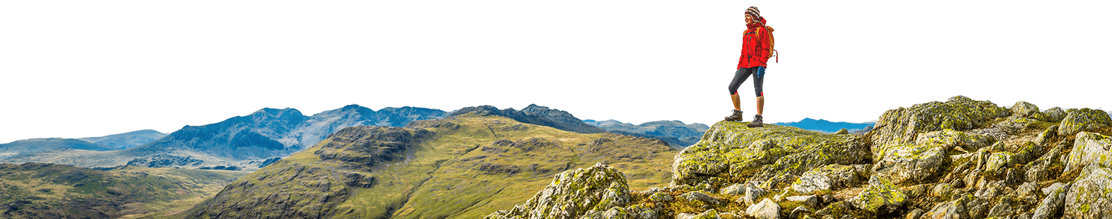 A person in a red jacket stands with a WT-branded hiking pole on a rocky mountain peak, overlooking a vast, mountainous landscape.